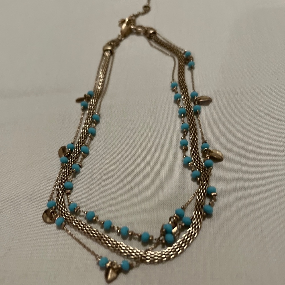 Kenneth Cole Gold Tone Faux Turquoise Three Strand Necklace.